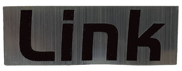 laser engraved brushed foil that looks  like brushed steel